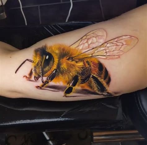 realistic bee tattoo.